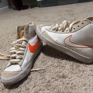 Nike High-Top Sneakers with Orange Swoosh